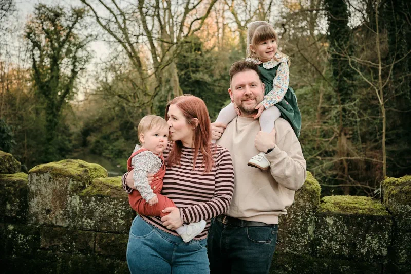 Parents hugging their children during a Mother&rsquo;s Day photoshoot in Jesmond, Newcastle upon Tyne
